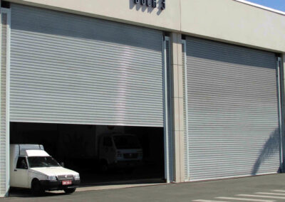 Distribuidora de portas de enrolar automáticas